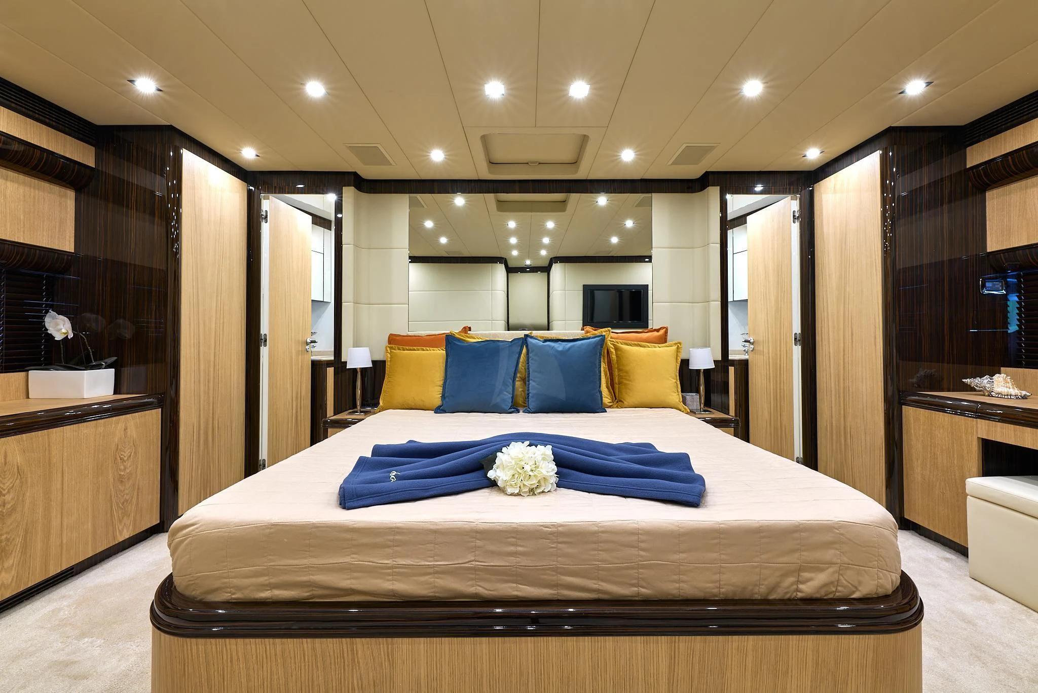 a large hotel room with a large bed aboard ATHOS Yacht for Sale