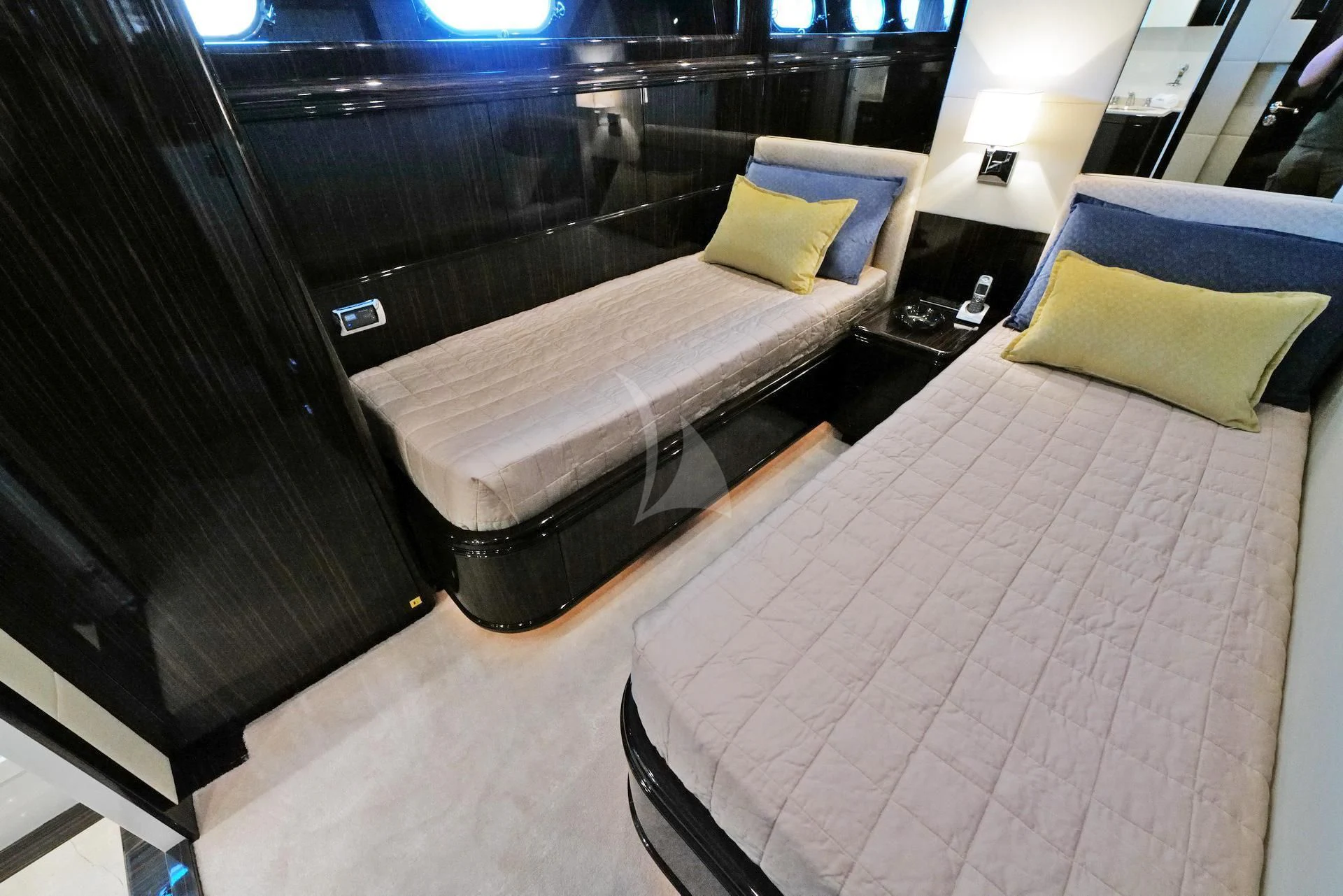 a bed in a room aboard ATHOS Yacht for Sale