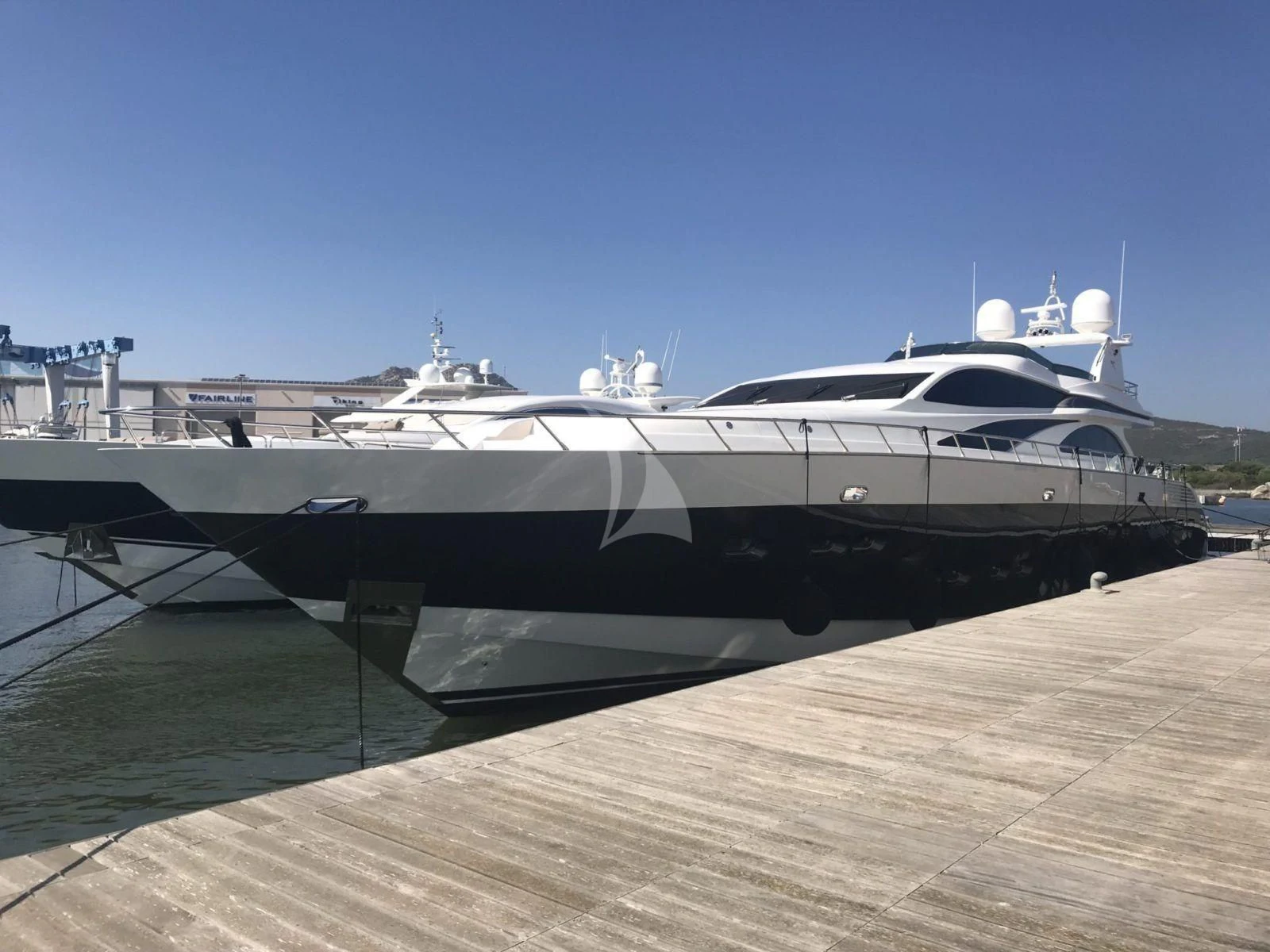 a large yacht docked aboard ATHOS Yacht for Sale