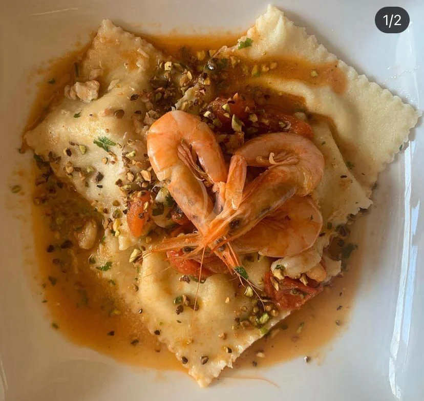 a plate of food aboard ATHOS Yacht for Sale