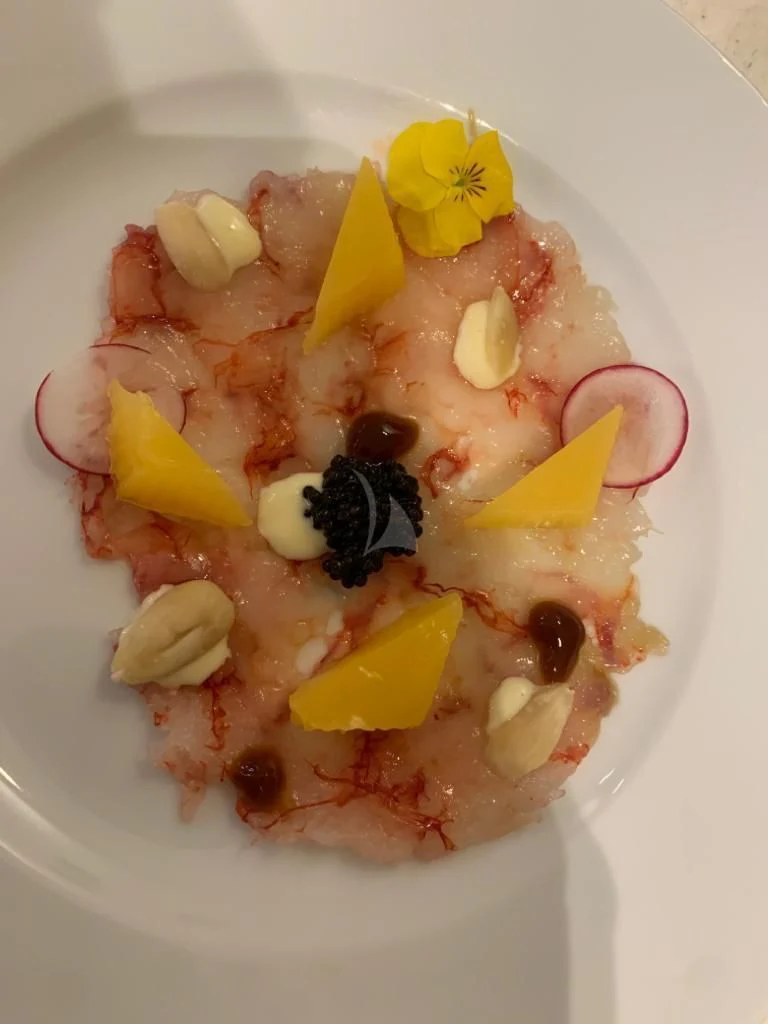 a plate of food aboard ATHOS Yacht for Sale