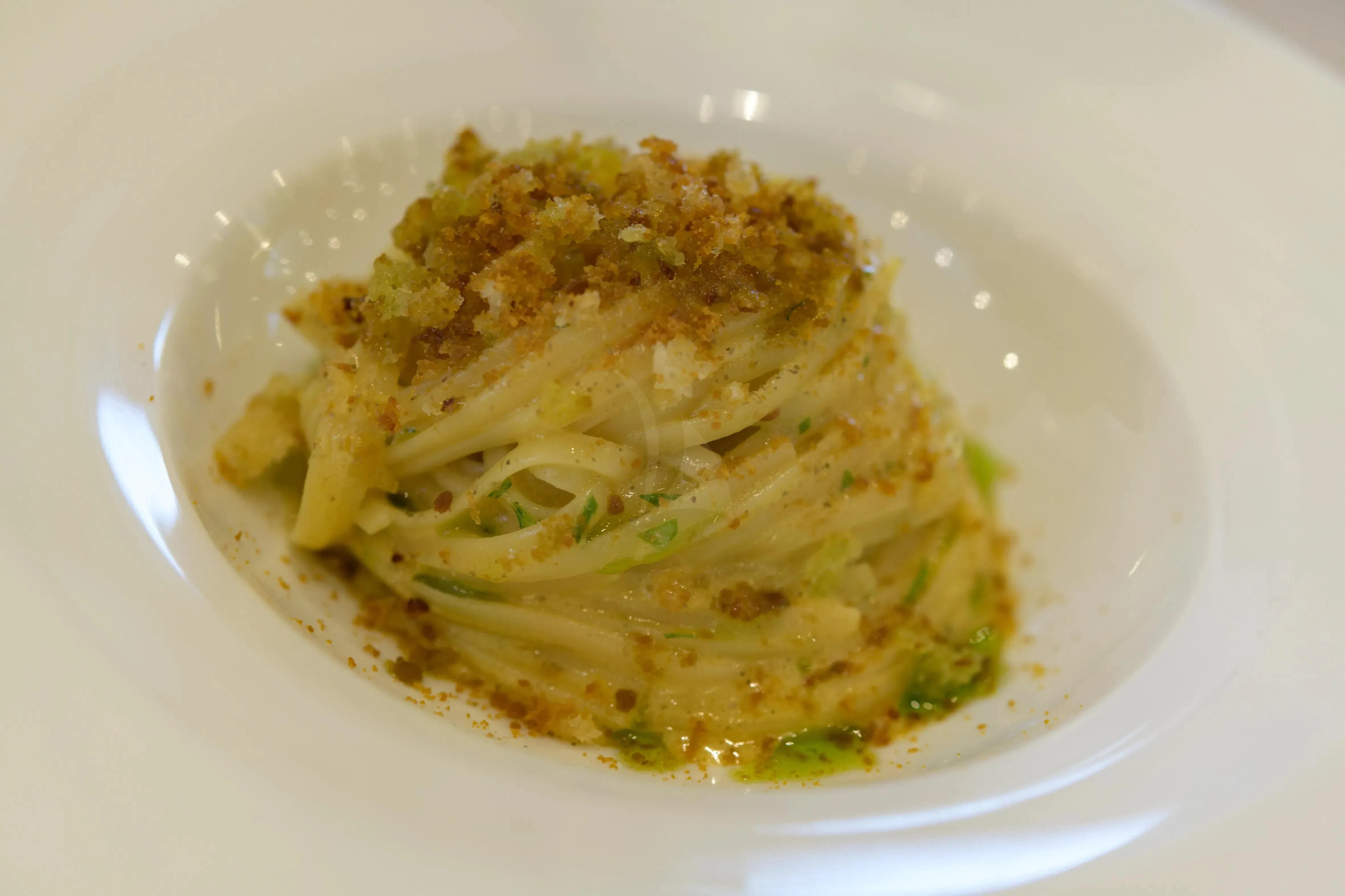 a plate of food aboard ATHOS Yacht for Sale