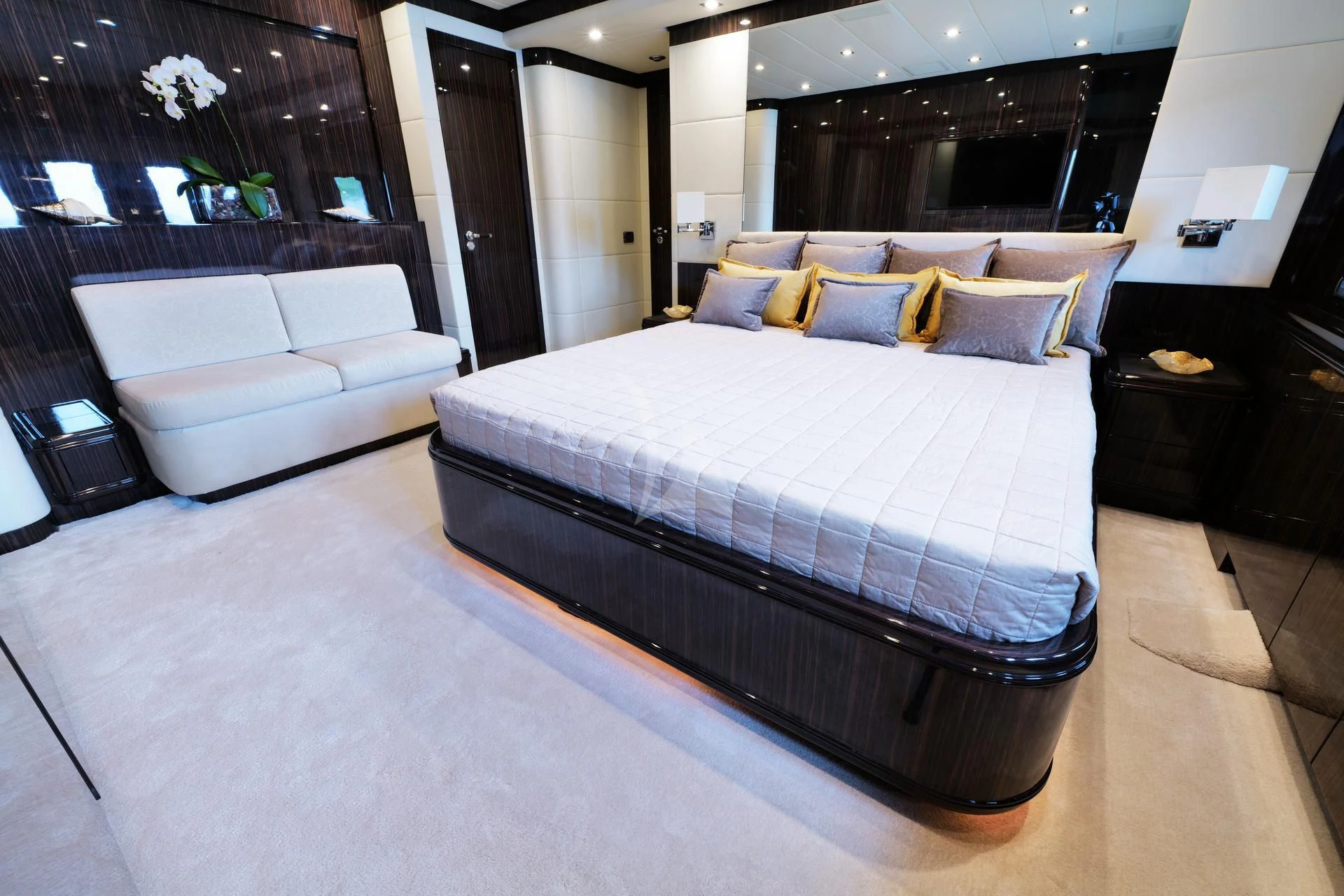 a bed in a room aboard ATHOS Yacht for Sale