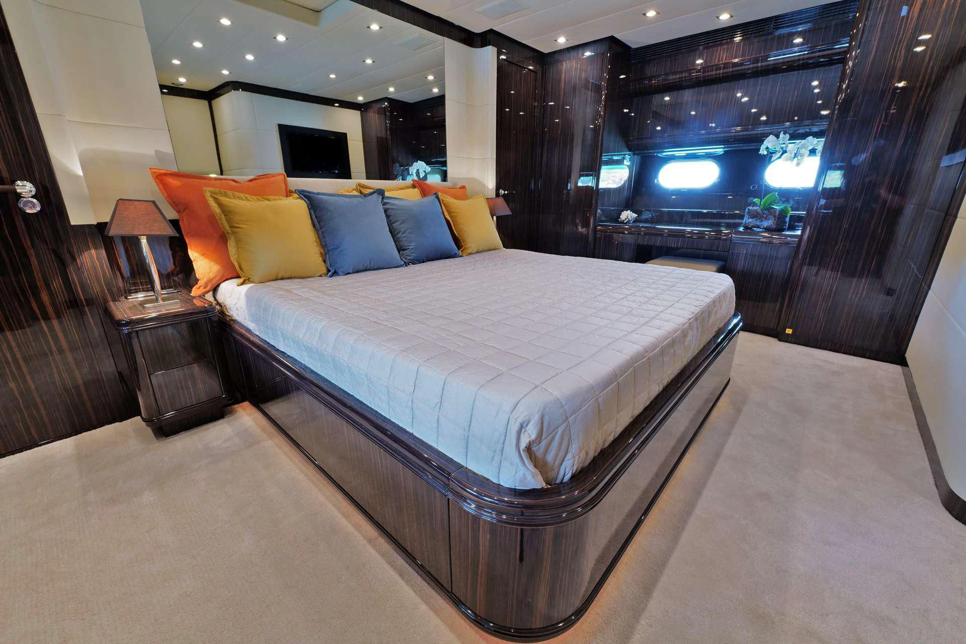 a bed in a room aboard ATHOS Yacht for Sale