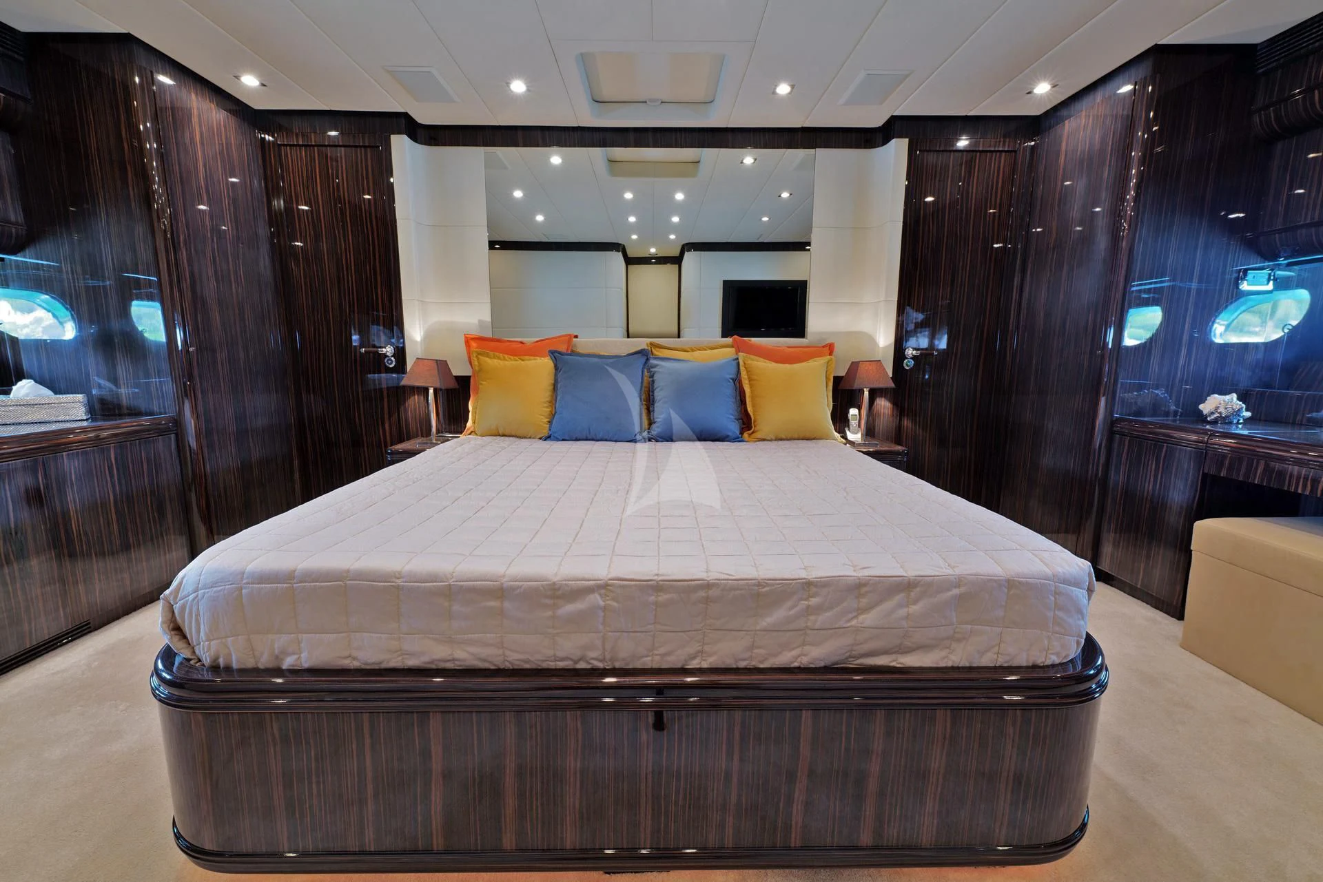 a bed in a room aboard ATHOS Yacht for Sale