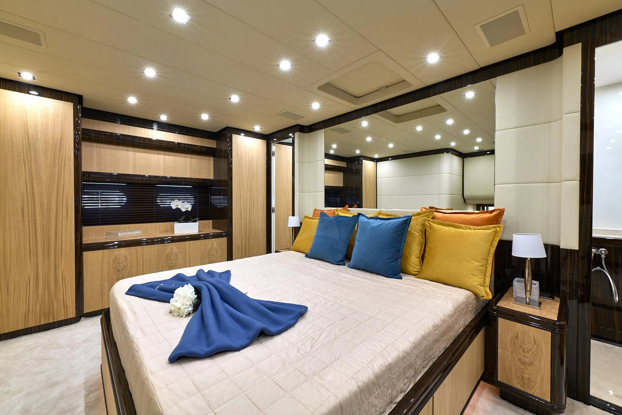 a large bed in a room aboard ATHOS Yacht for Sale