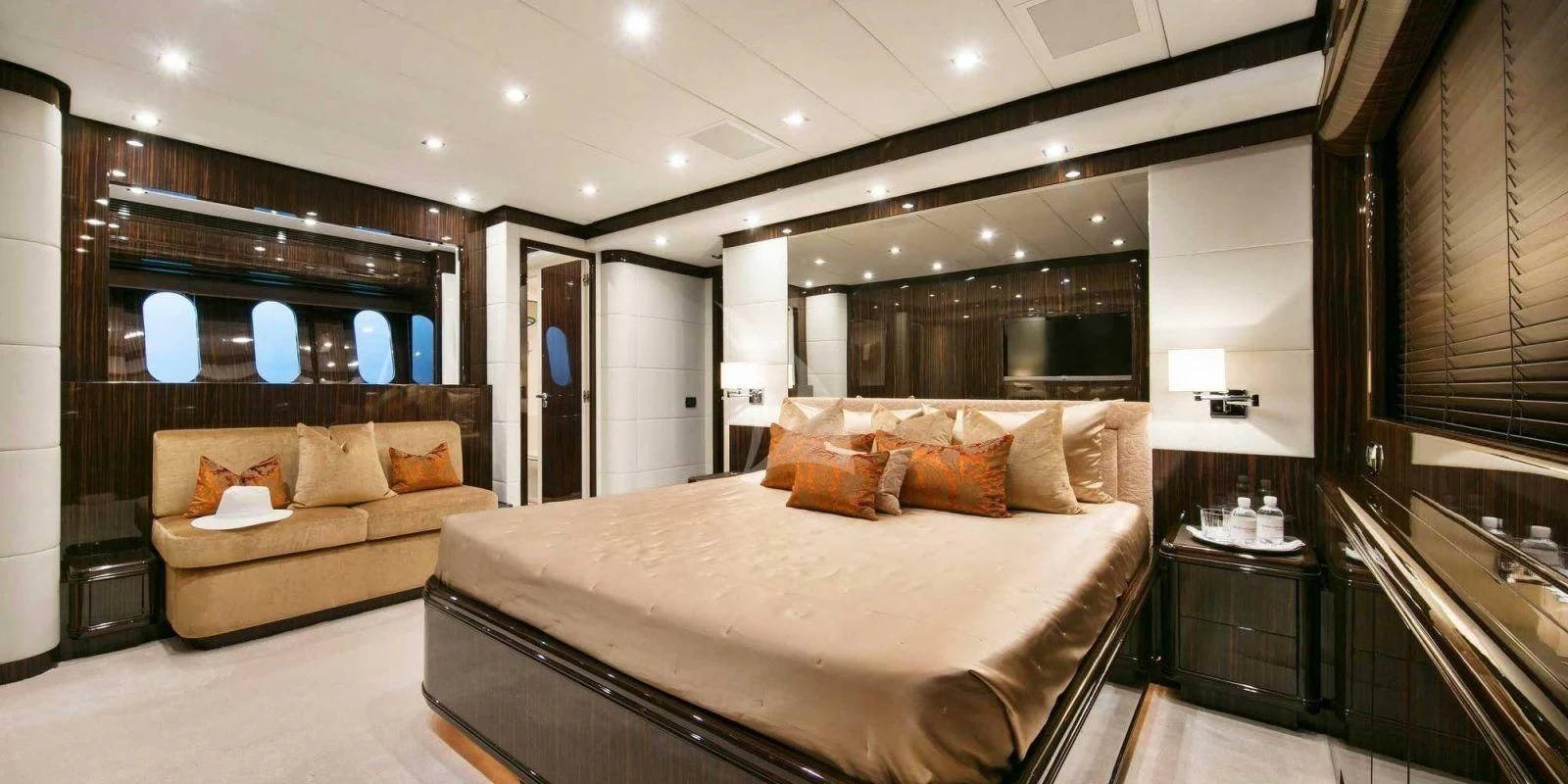 a large bedroom with a bed aboard ATHOS Yacht for Sale