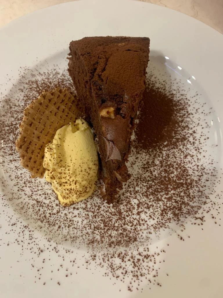 a plate of food aboard ATHOS Yacht for Sale