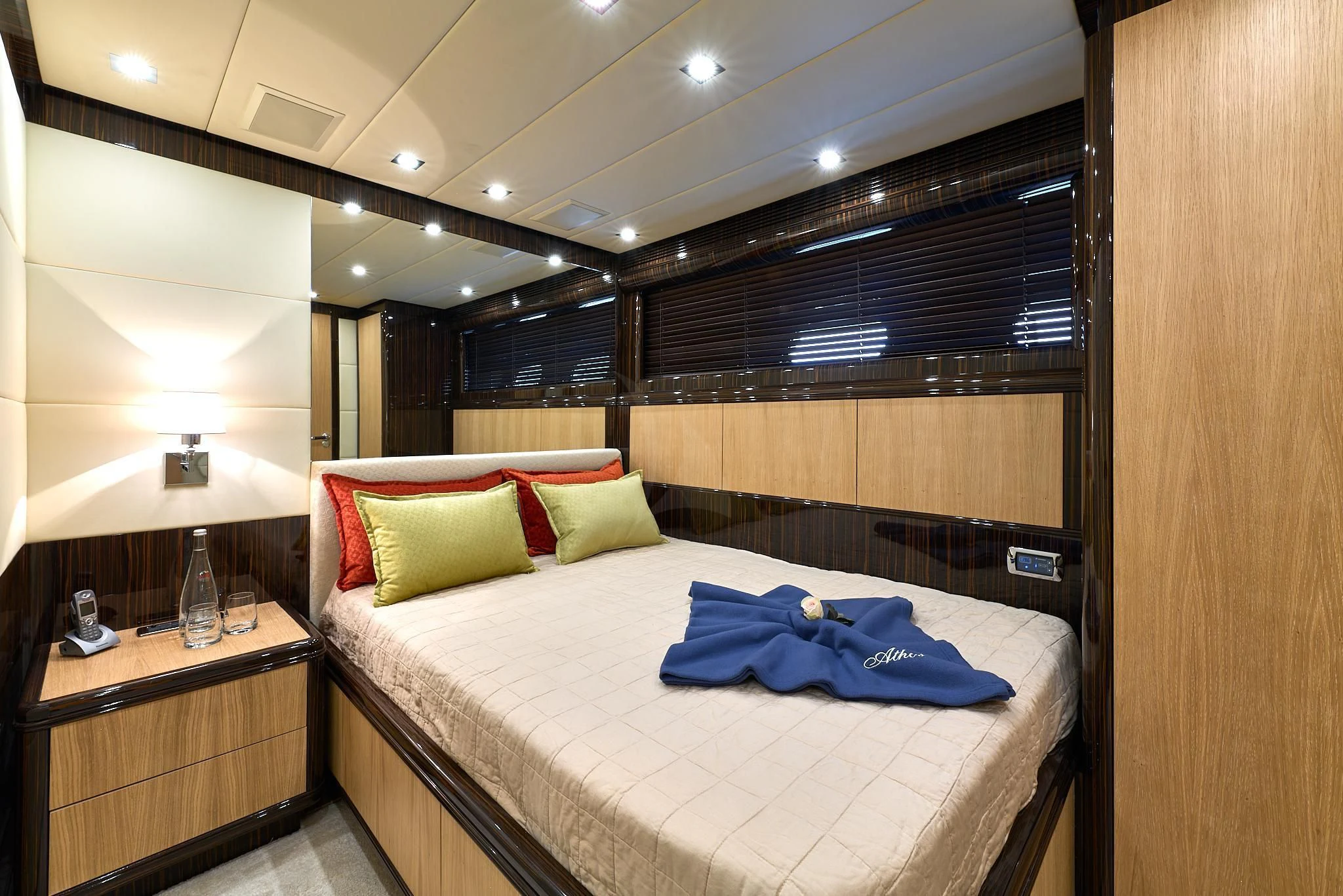 a bed in a room aboard ATHOS Yacht for Sale