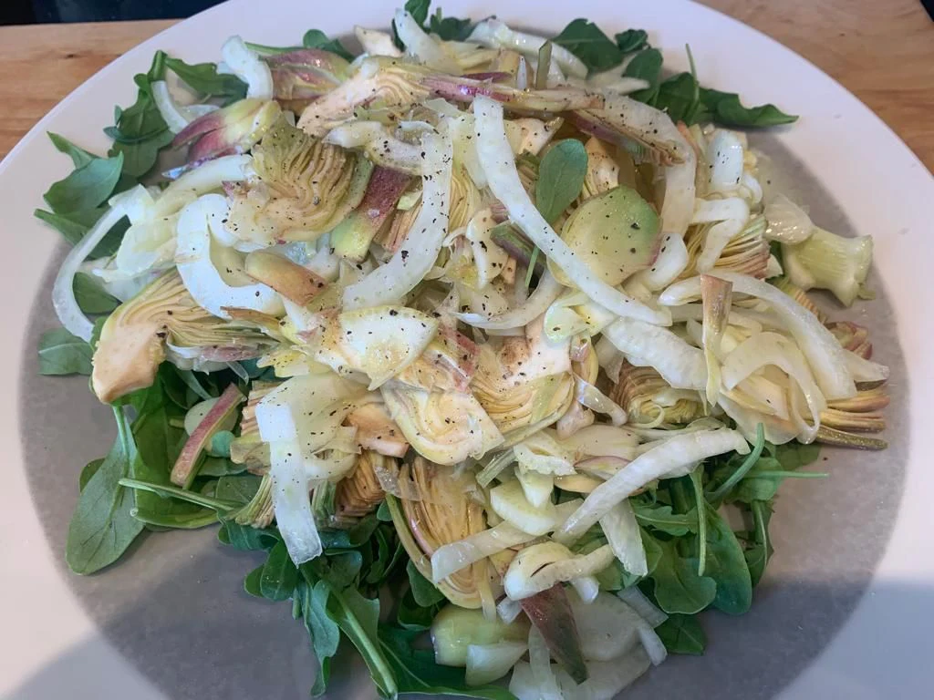 a plate of food aboard ATHOS Yacht for Sale