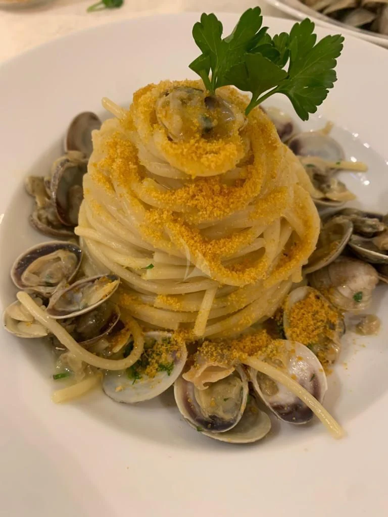 a plate of oysters on a white plate aboard ATHOS Yacht for Sale