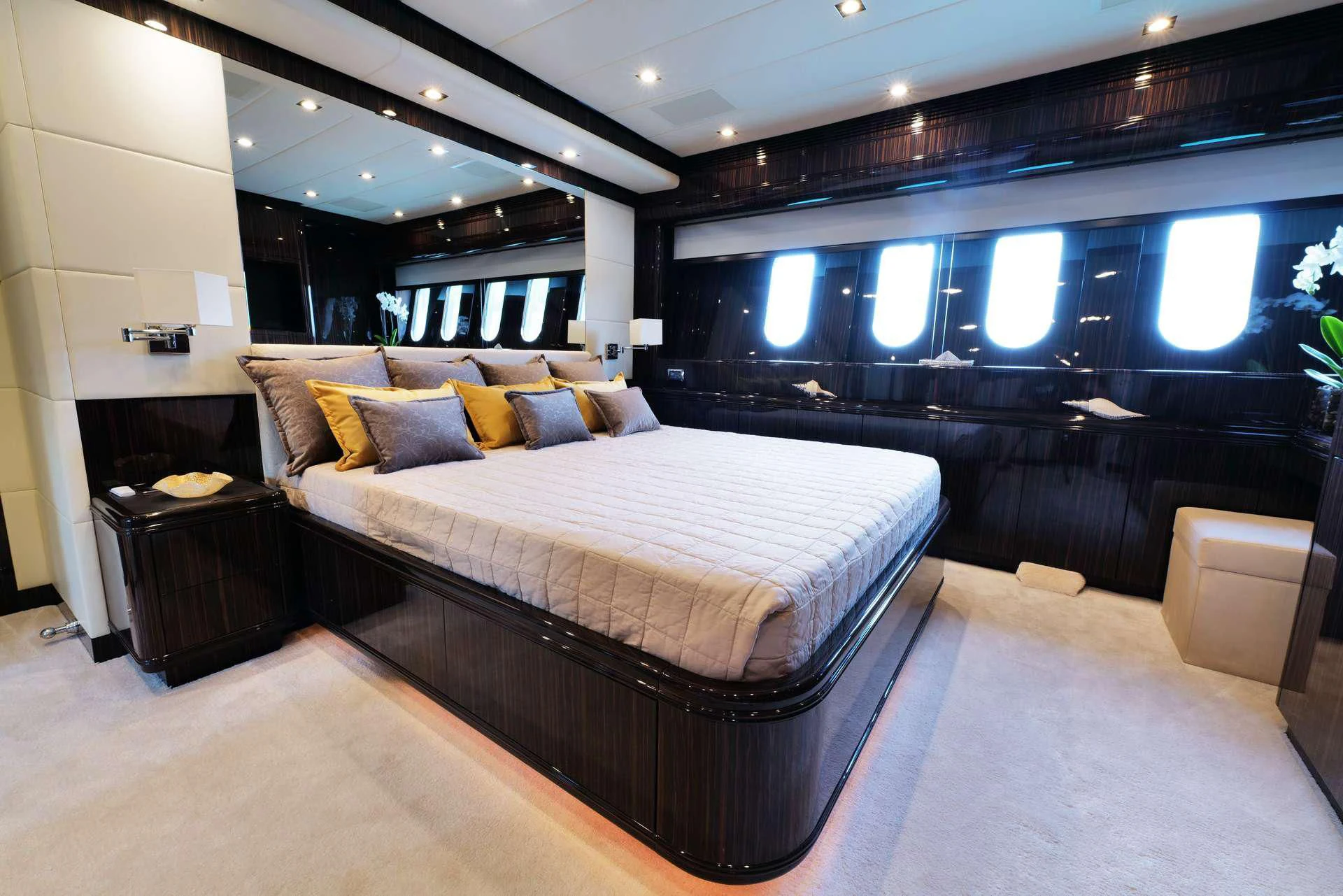 a large bed in a room aboard ATHOS Yacht for Sale