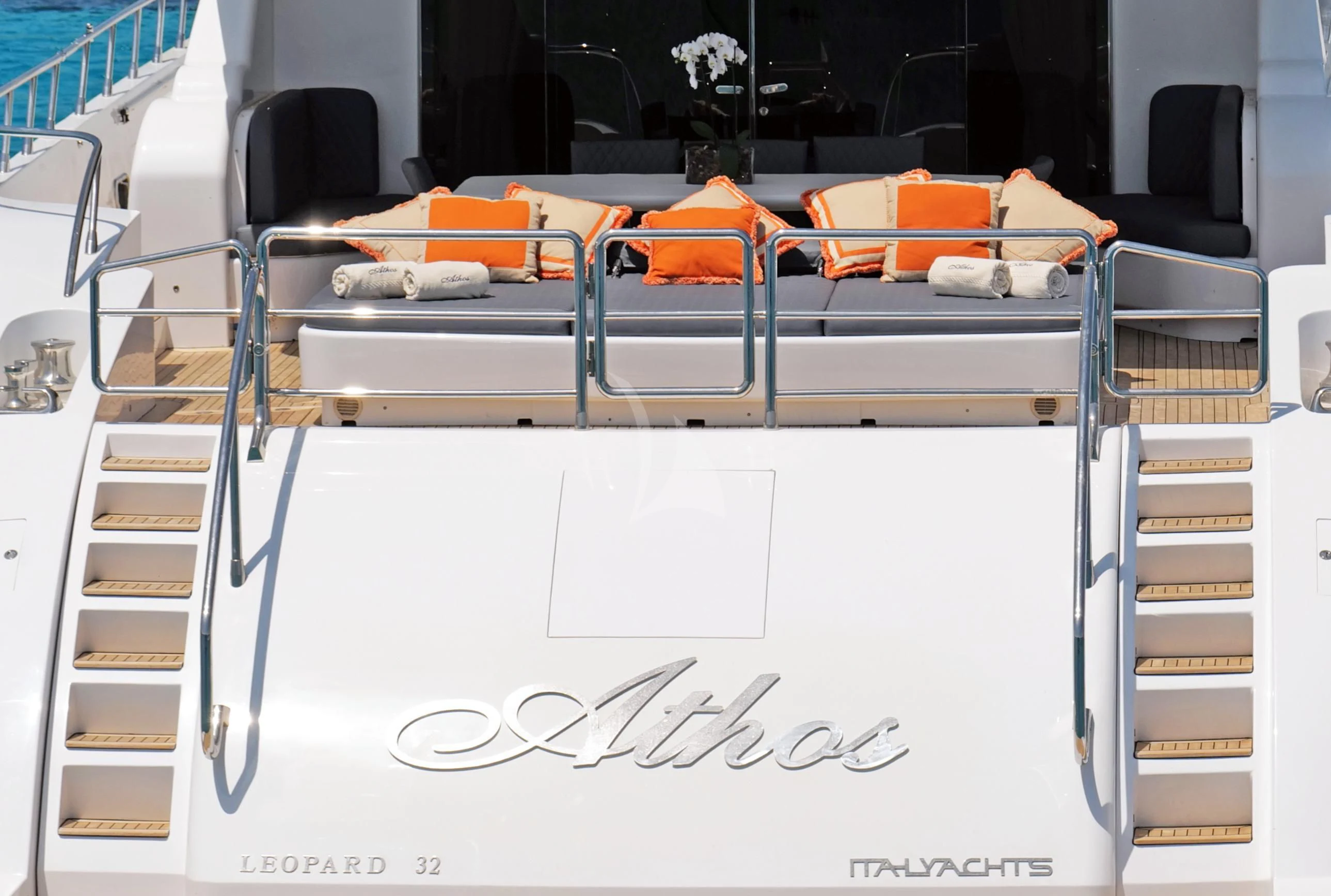 a white board with a black chair and orange seats aboard ATHOS Yacht for Sale