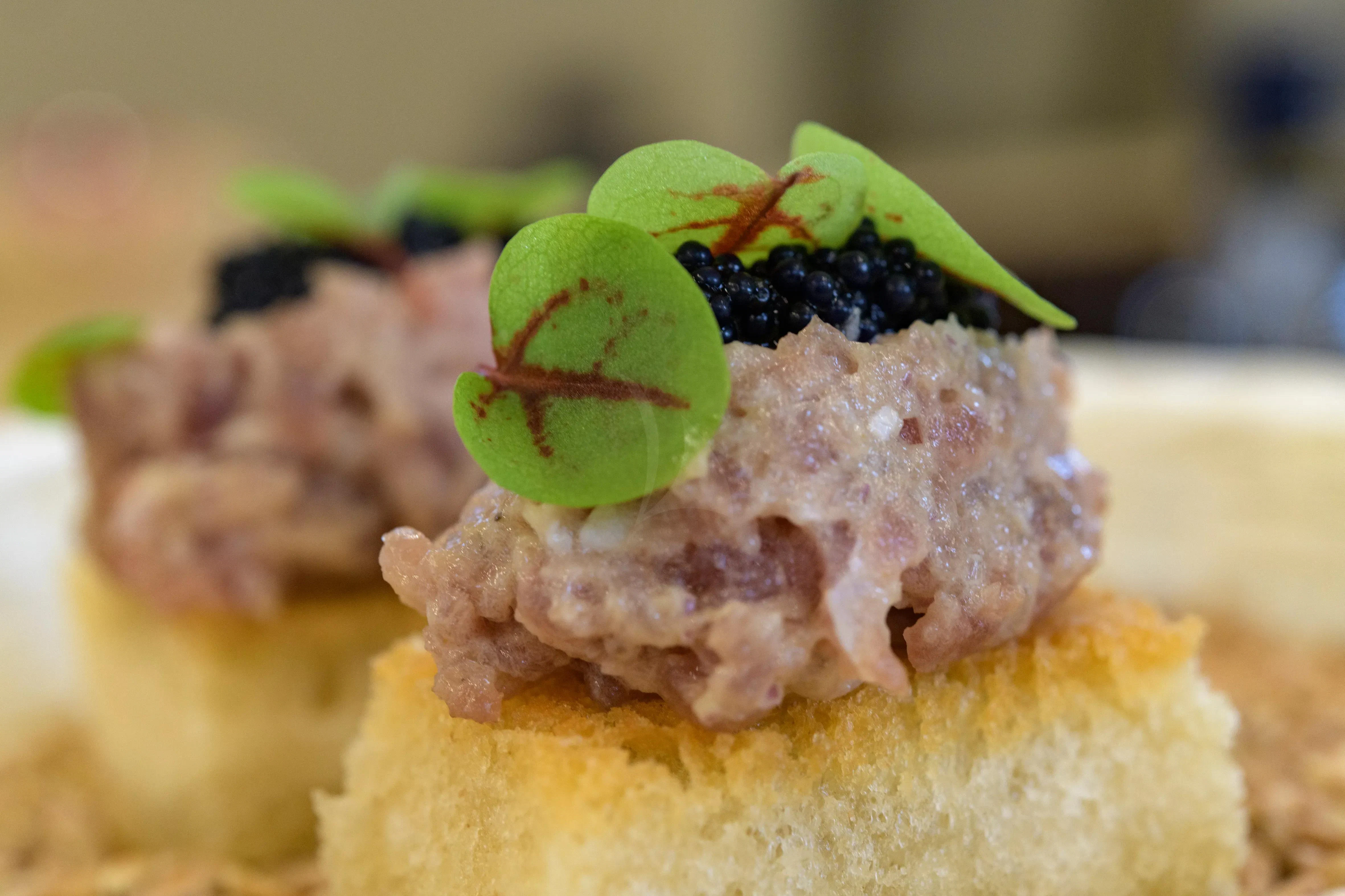 a plate of food aboard ATHOS Yacht for Sale