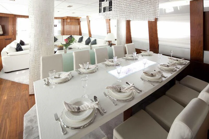 a table set for a dinner aboard NASER II Yacht for Sale