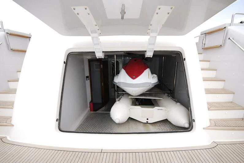 a white machine with a red hat aboard NASER II Yacht for Sale