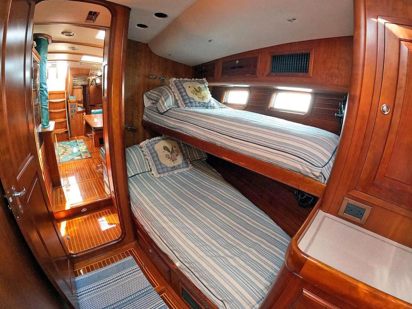 a room with bunk beds aboard WILD THING Yacht for Sale