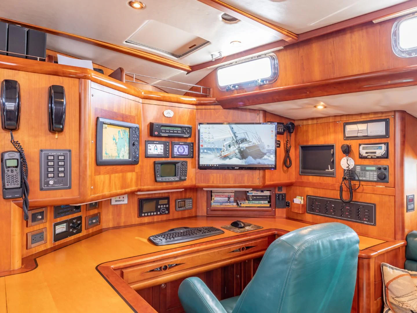 a room with a desk and computer aboard WILD THING Yacht for Sale