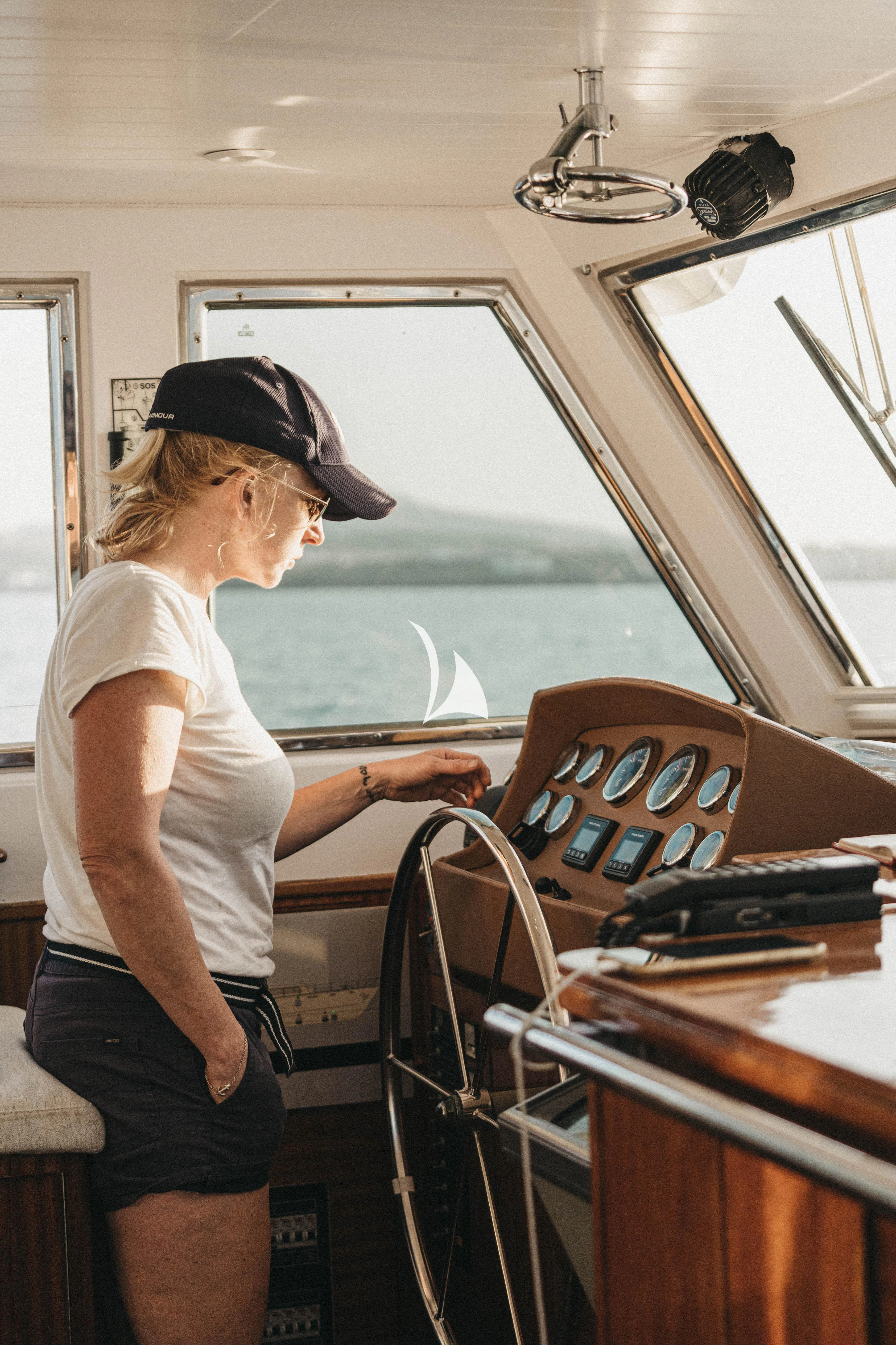 a man playing a piano aboard CIUTADELLA Yacht for Sale