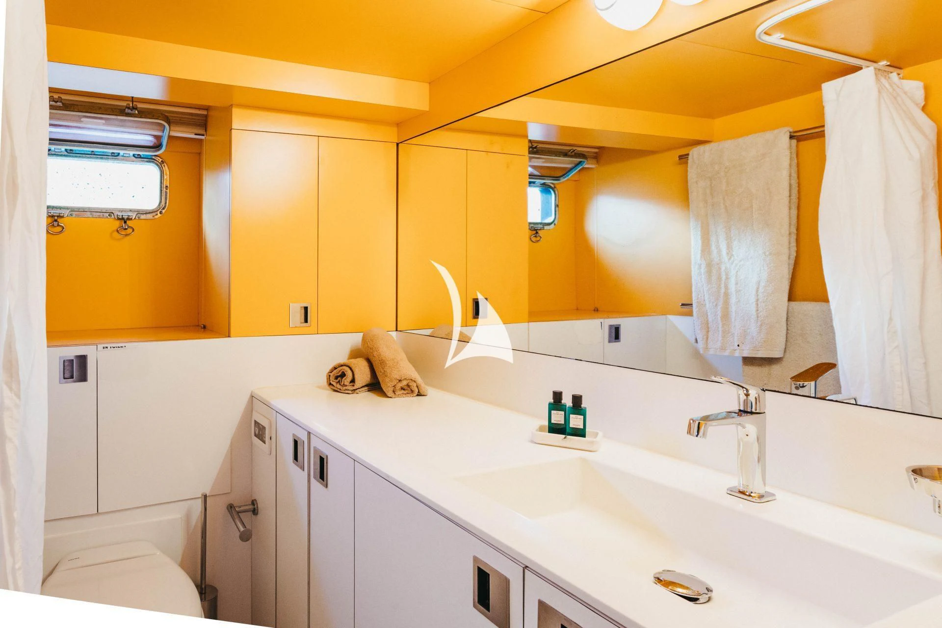 a bathroom with a sink and toilet aboard CIUTADELLA Yacht for Sale