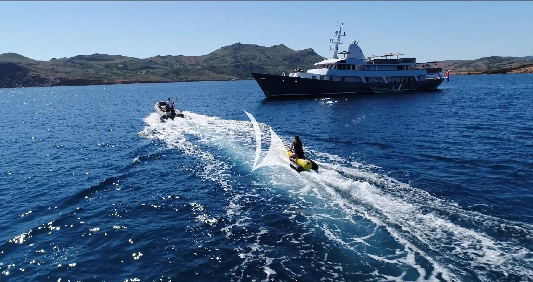 a boat and a boat on the water aboard CIUTADELLA Yacht for Sale