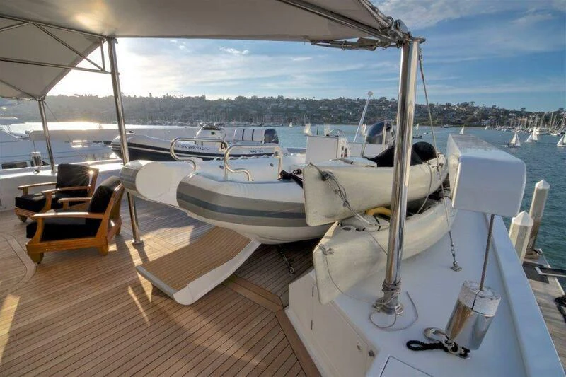 a boat on a deck aboard SCORPIO Yacht for Sale