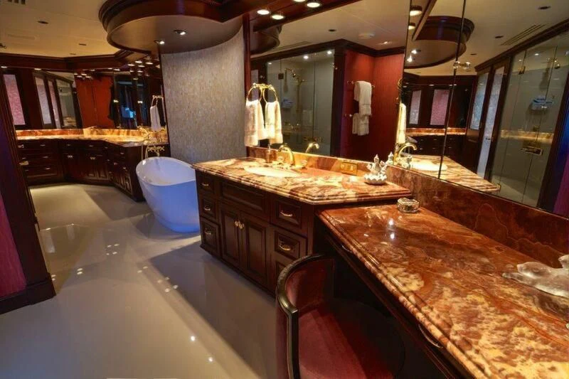a kitchen with a countertop sink and cabinets aboard SCORPIO Yacht for Sale