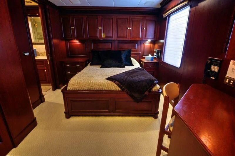 a bed in a room aboard SCORPIO Yacht for Sale