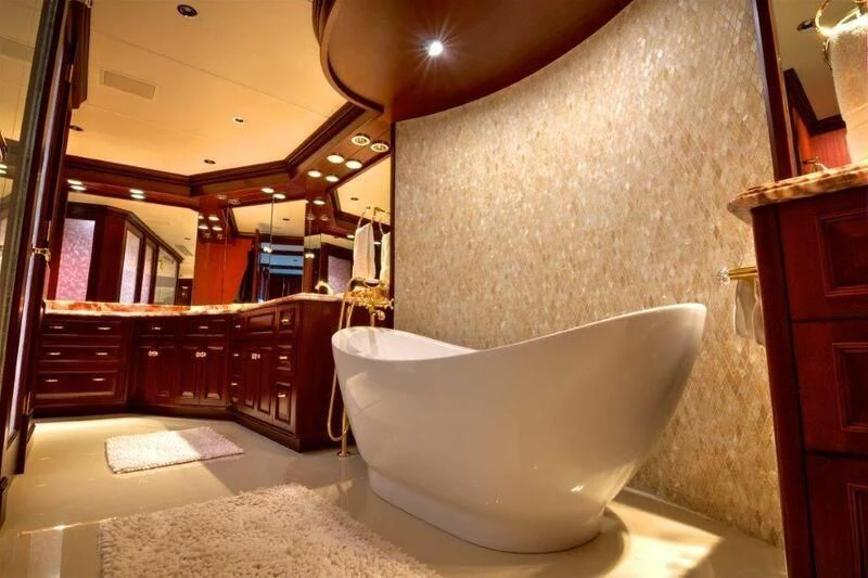 a large bathroom with a large tub aboard SCORPIO Yacht for Sale