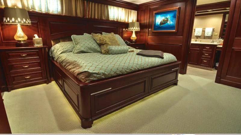 a bed in a room aboard SCORPIO Yacht for Sale