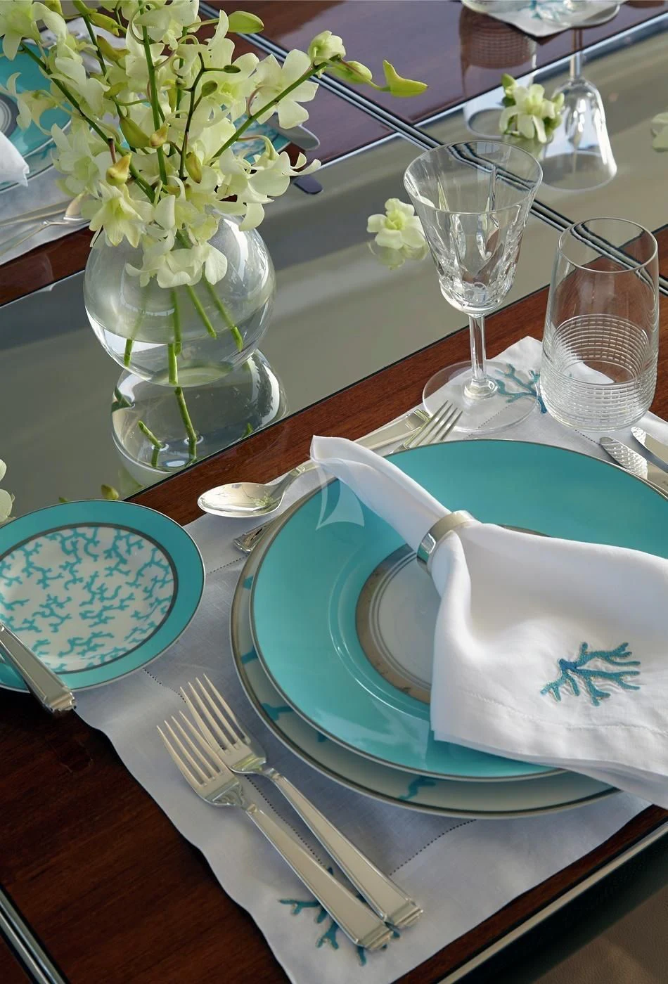 a table with place settings aboard ILLUSION Yacht for Sale