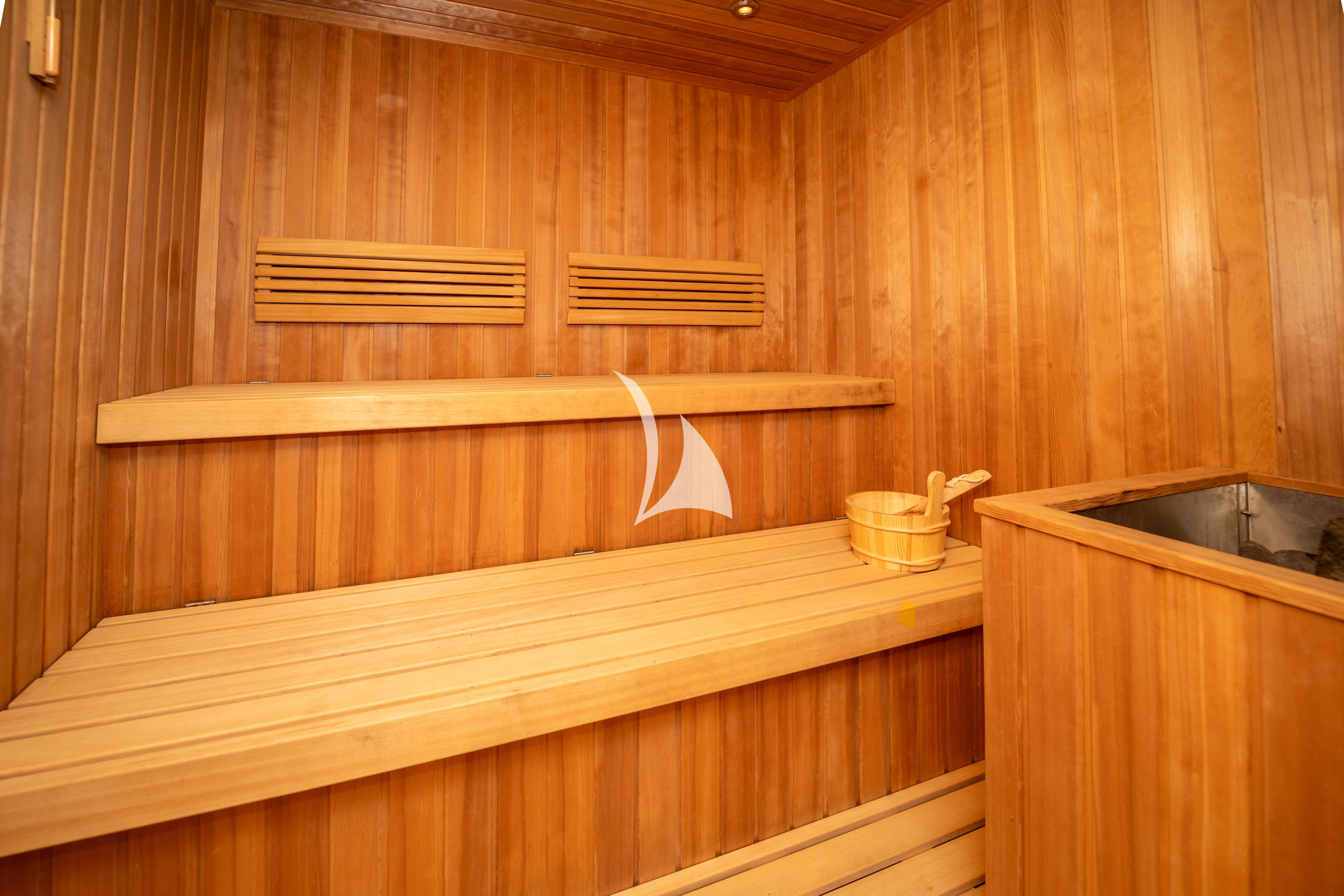 a bird flying over a wooden shelf aboard ILLUSION Yacht for Sale