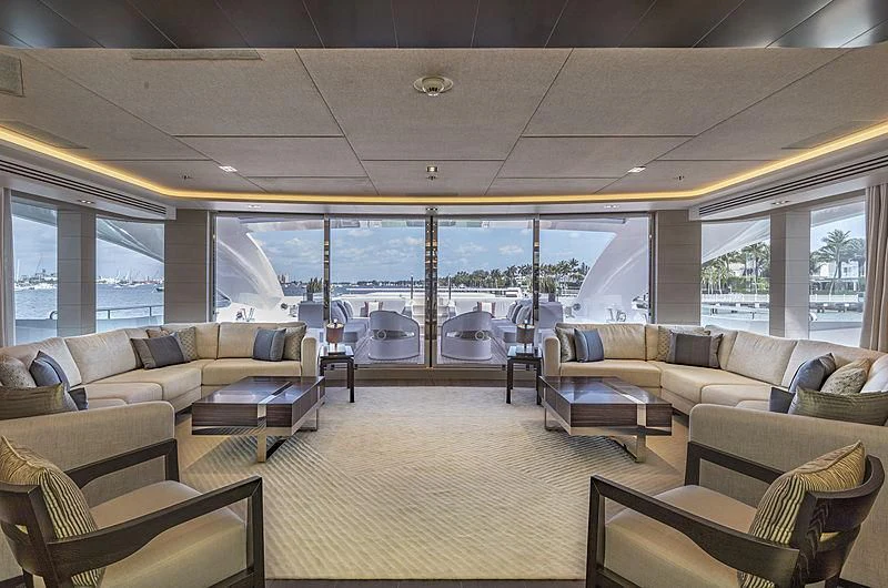 a living room with a large window aboard ILLUSION Yacht for Sale