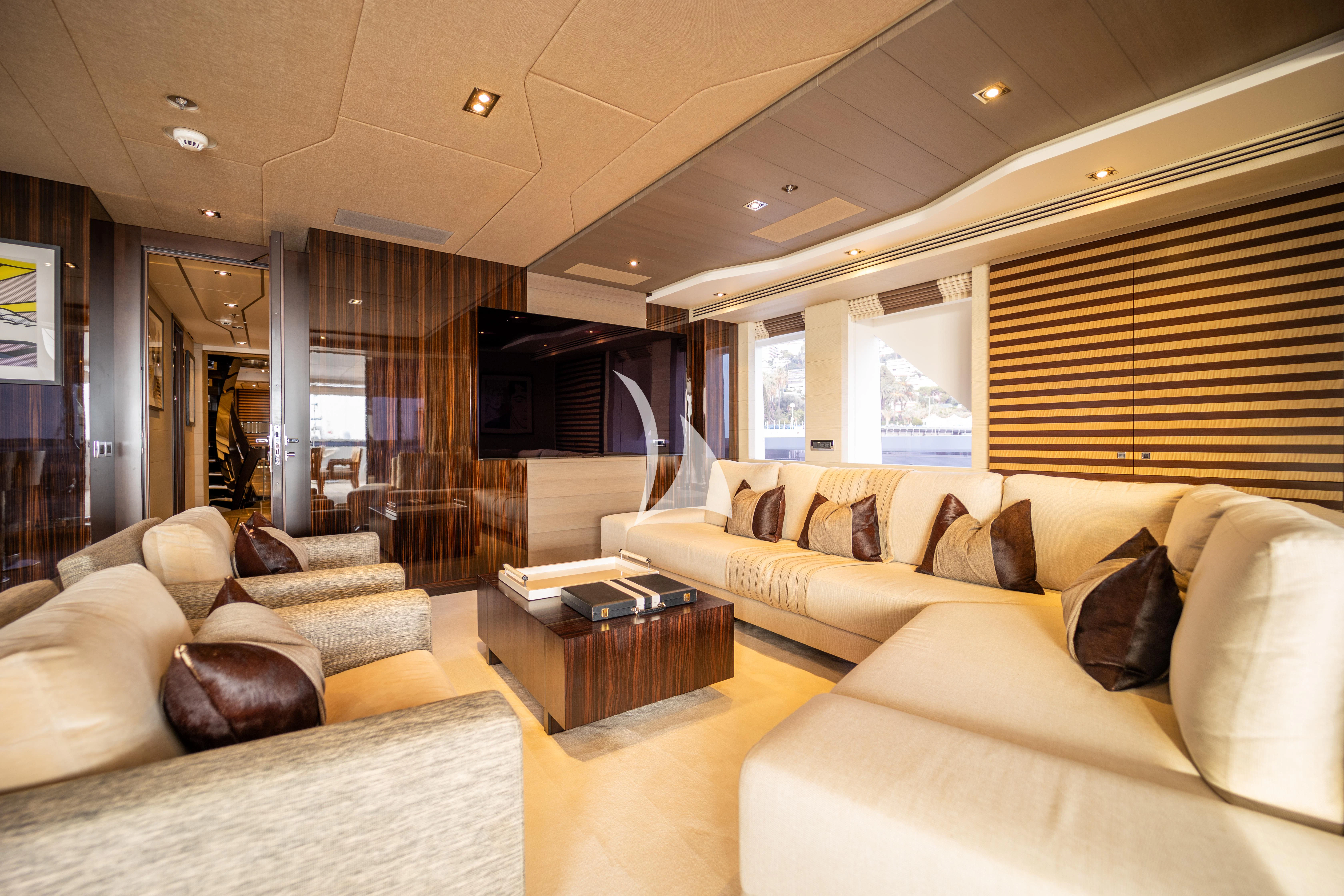 a living room with a large window aboard ILLUSION Yacht for Sale