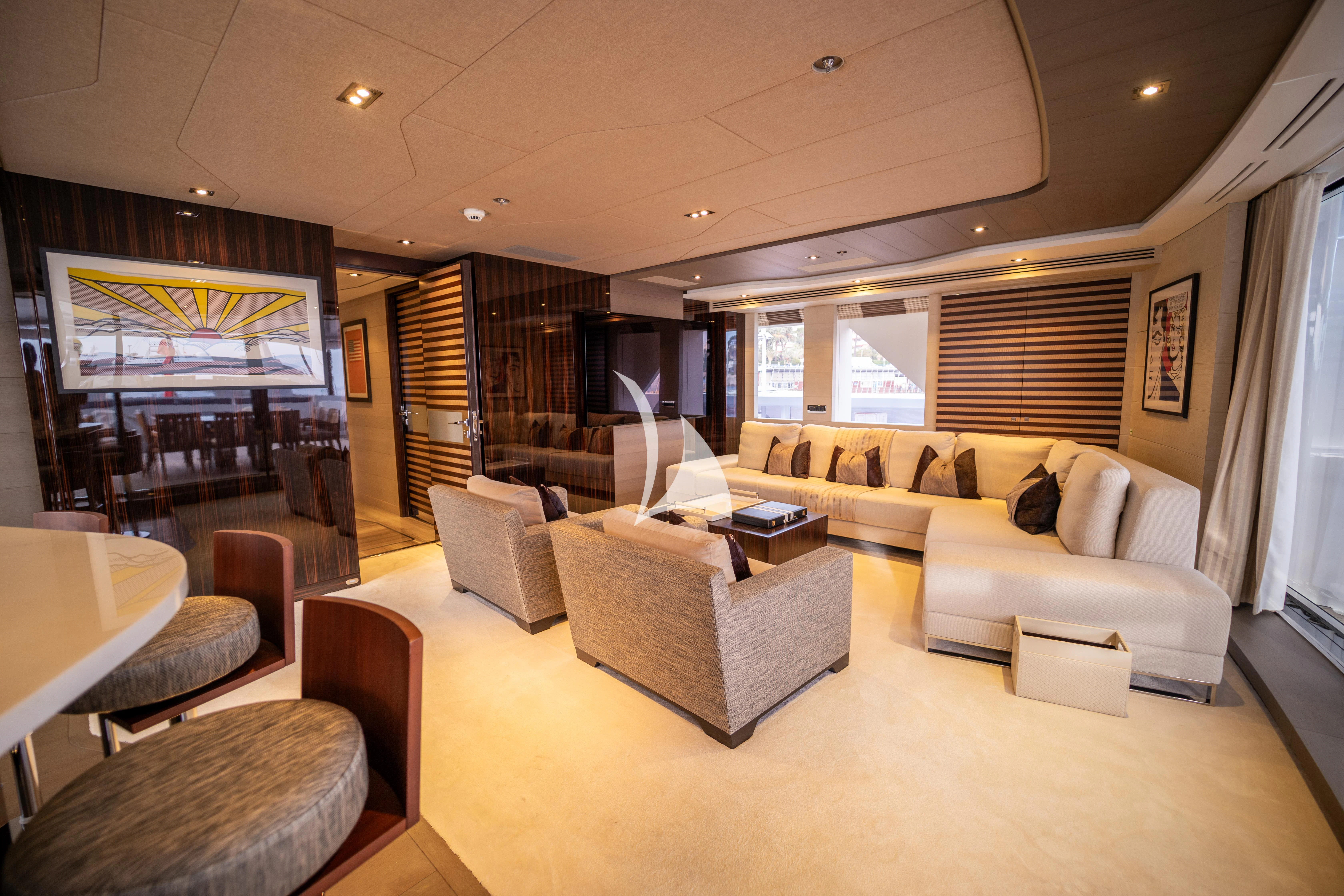 a living room with a large window aboard ILLUSION Yacht for Sale