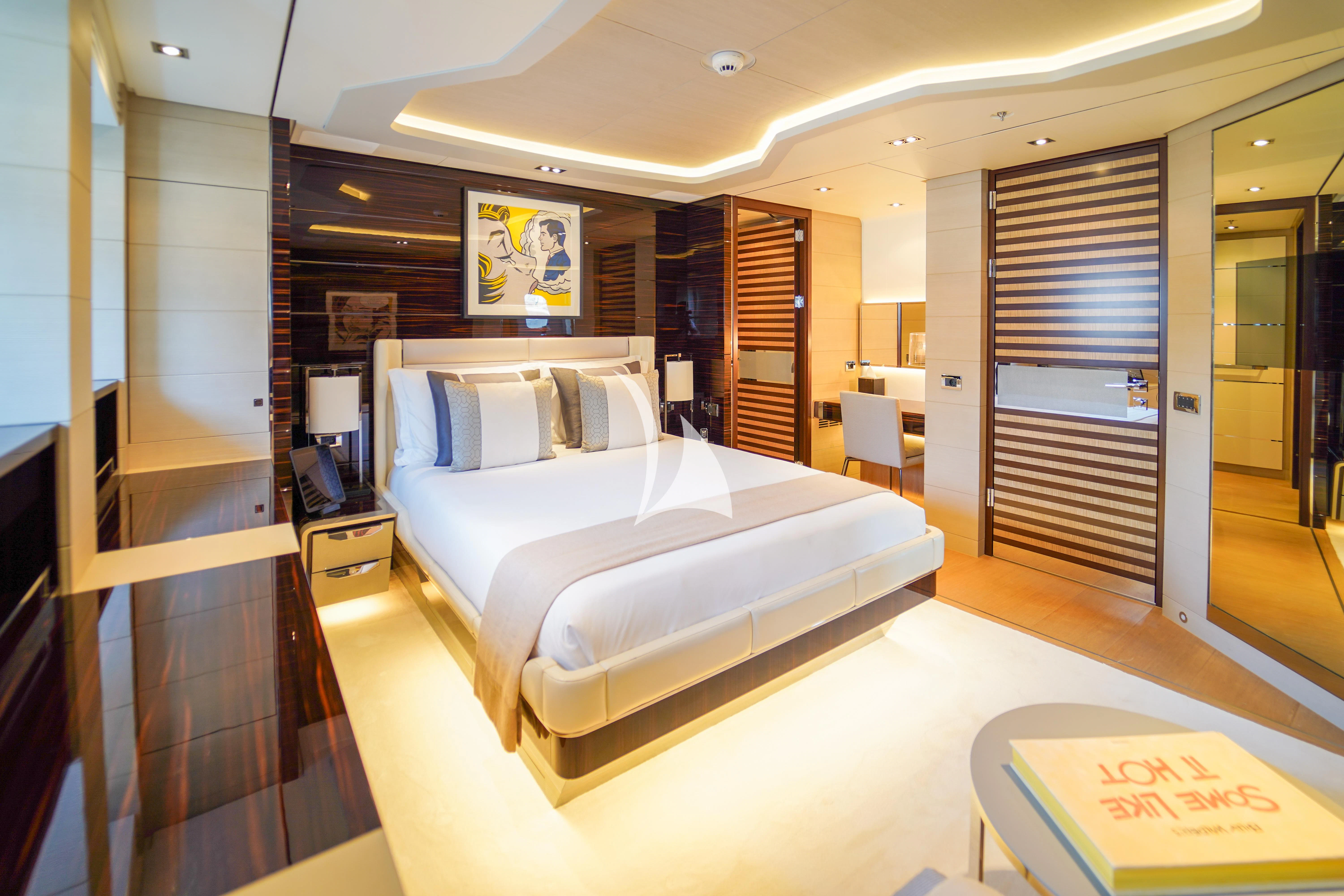 a room with a bed and a closet aboard ILLUSION Yacht for Sale