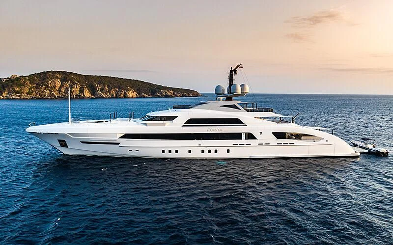 a white yacht in the water aboard ILLUSION Yacht for Sale