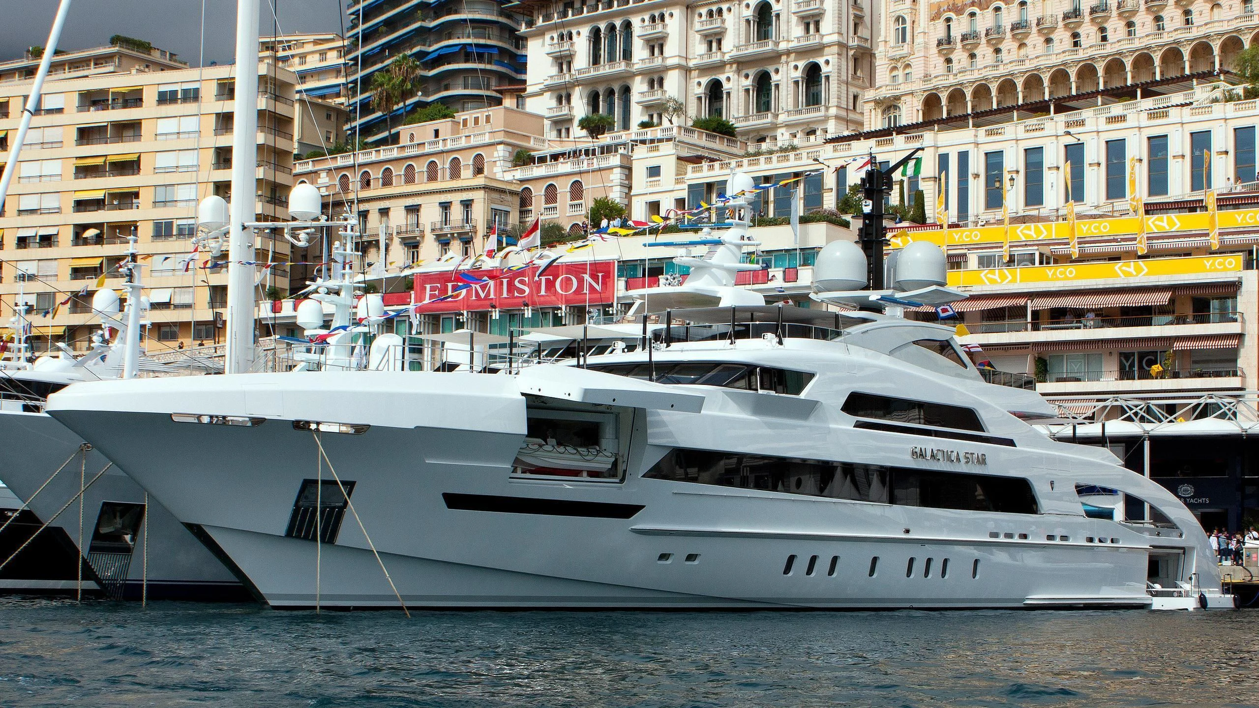 a white yacht in the water aboard ILLUSION Yacht for Sale