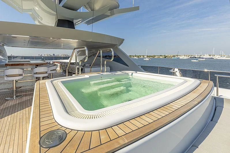 a swimming pool on a deck aboard ILLUSION Yacht for Sale