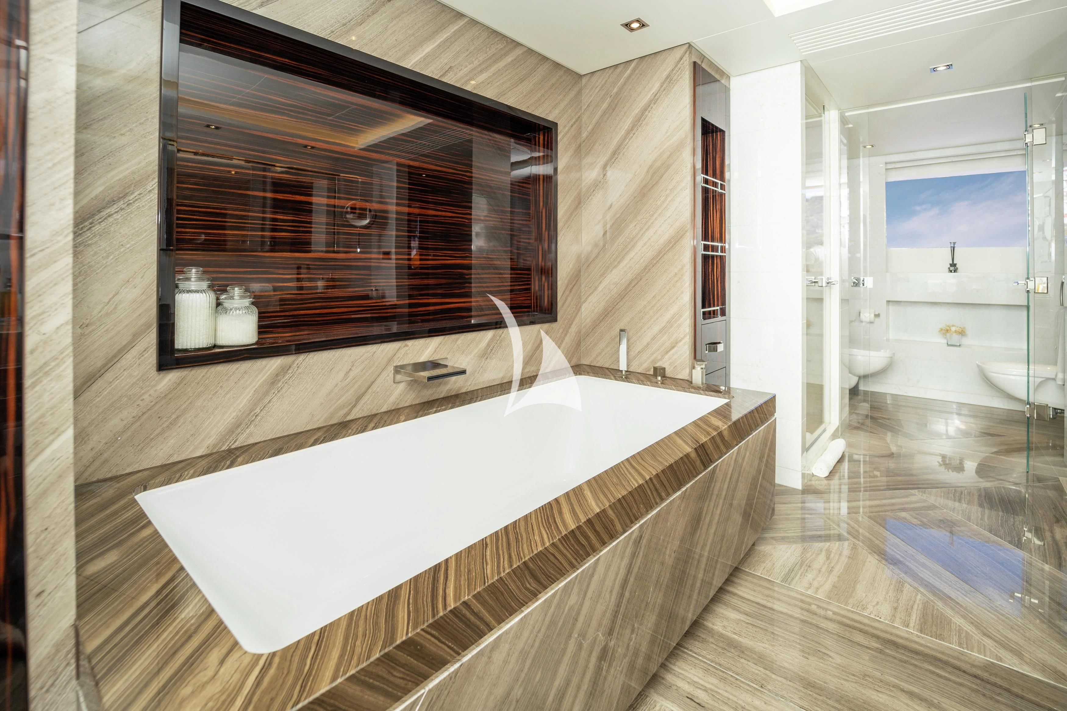 a large bathroom with a large jacuzzi tub aboard ILLUSION Yacht for Sale