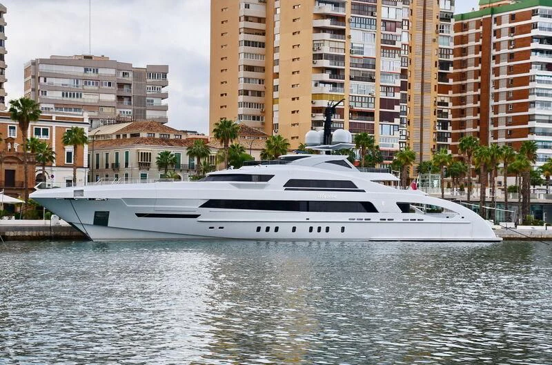 a white yacht in the water aboard ILLUSION Yacht for Sale
