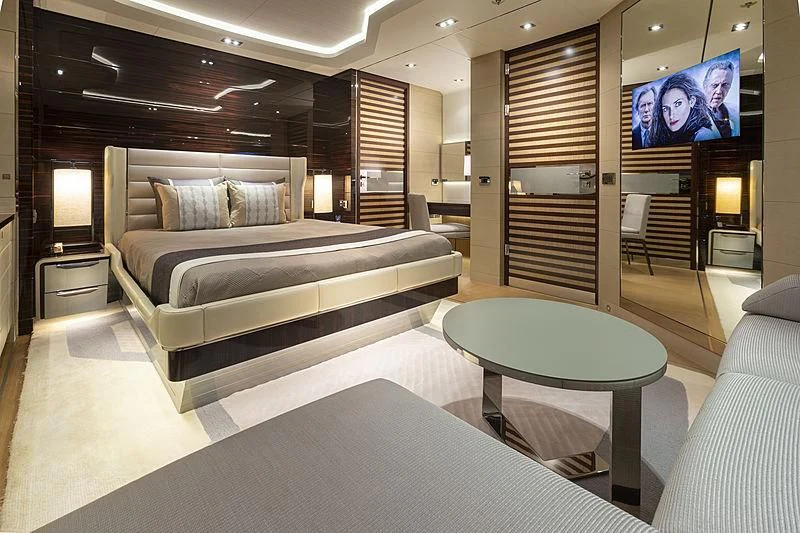 a living room with a couch and a table aboard ILLUSION Yacht for Sale