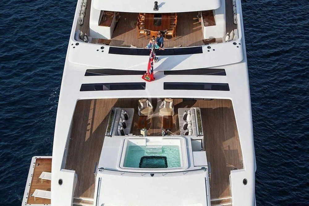 a boat with a sail on the water aboard ILLUSION Yacht for Sale