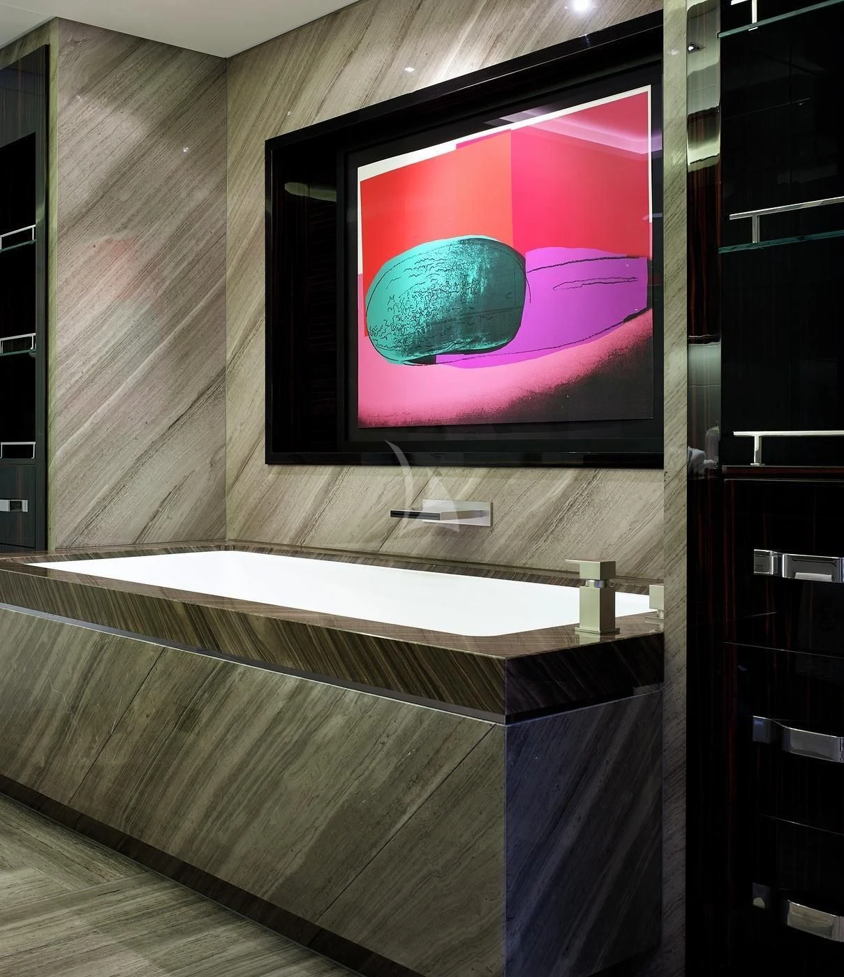 a tv on a wall aboard ILLUSION Yacht for Sale