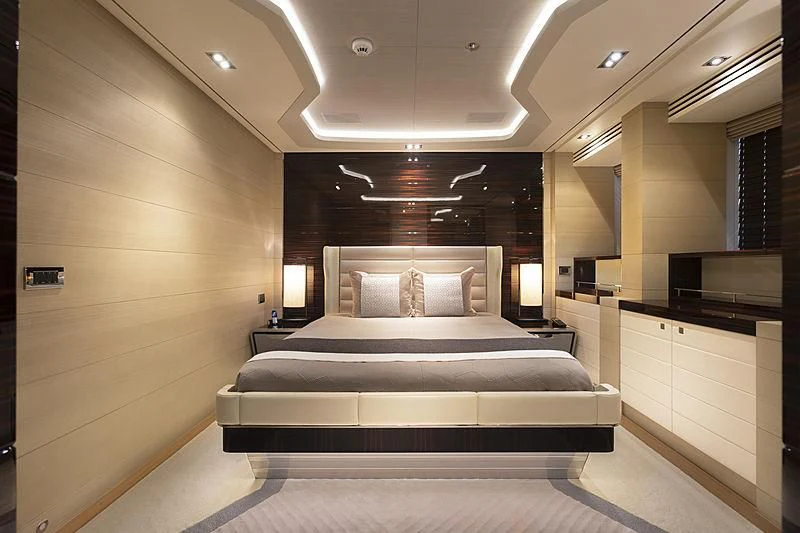 a bed in a room aboard ILLUSION Yacht for Sale