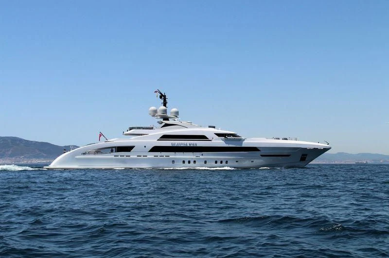 a white yacht in the water aboard ILLUSION Yacht for Sale