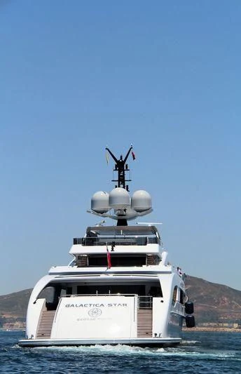 a boat with a satellite on top aboard ILLUSION Yacht for Sale