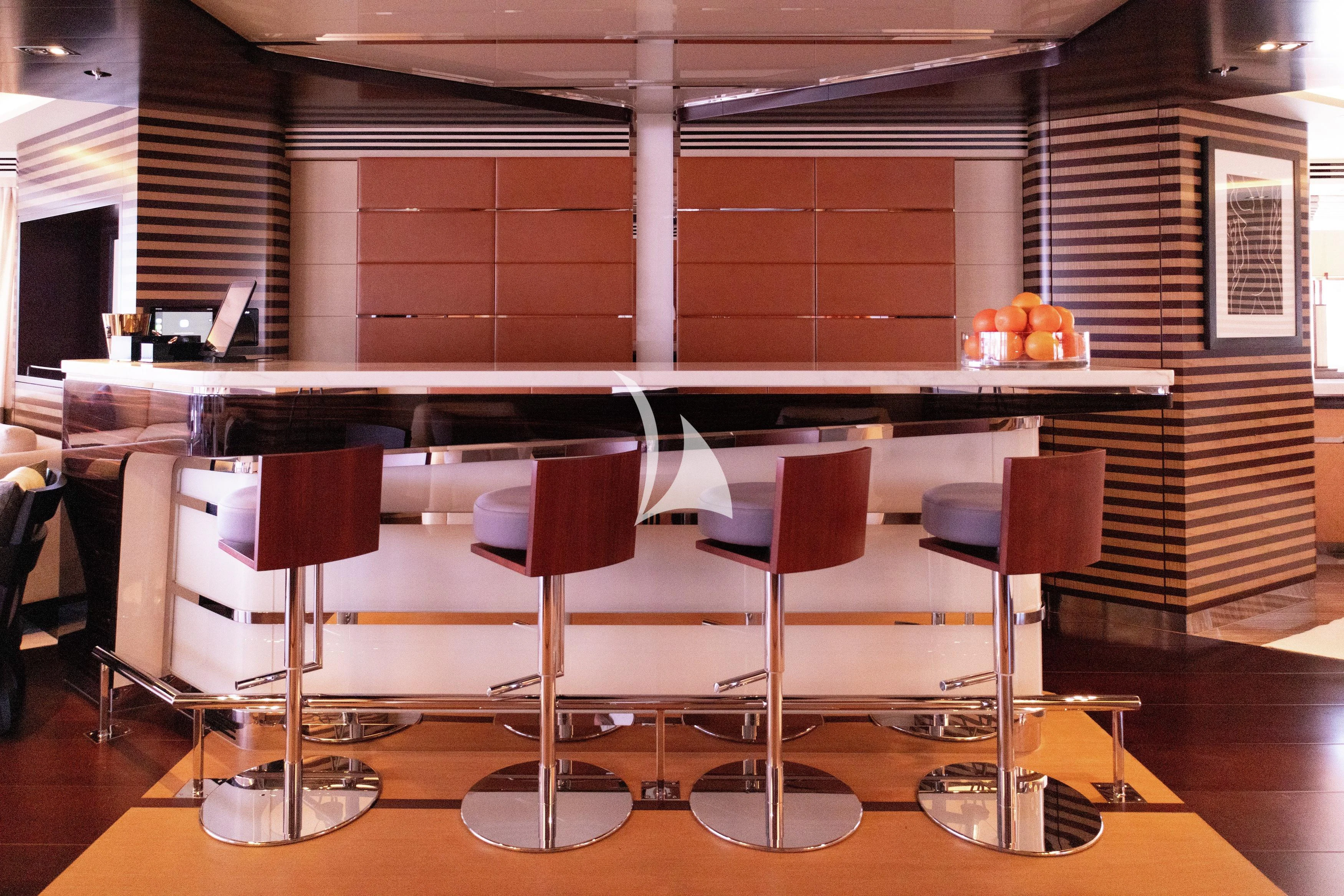 a piano in a room aboard ILLUSION Yacht for Sale