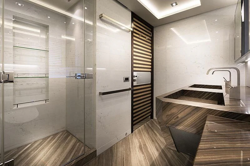 a room with a large glass shower aboard ILLUSION Yacht for Sale