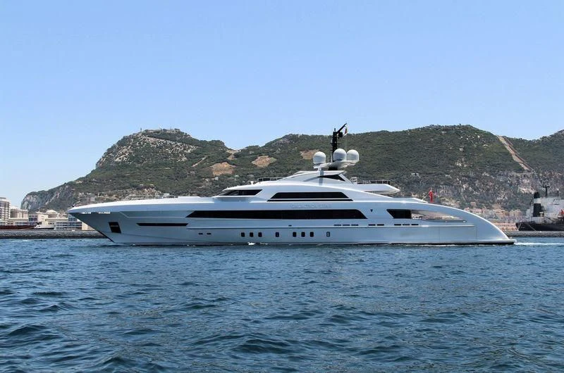 a white yacht in the water aboard ILLUSION Yacht for Sale